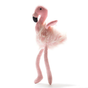 Flamingo soft toy - an adorable pink fluffy gift This large flamboyant flamingo soft toy makes a gorgeous gift for first birthdays and first Christmas. This brightly coloured flamingo has a fluffy body, pretty pink tweed legs and knitted wings. It also has a beautiful black beak and black stitched eyes. Shown on white background