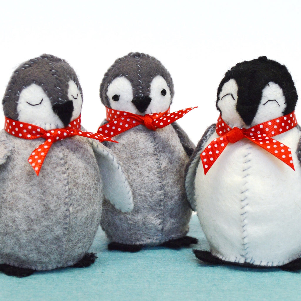 Baby Penguins Felt Craft Kit – sew together a waddle of 3 cute penguins! Three fun penguins felt kit, this box has everything you need to create a waddle (the collective noun for penguins on land) of penguins in a child's bedroom or use as Christmas decorations. 