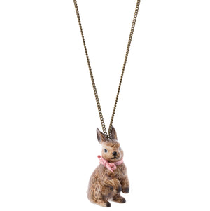 This rabbit necklace is so charming. This beautifully hand painted brown rabbit necklace is dressed with a pink bow. These hand painted necklaces have amazing detailed features that make the rabbit look adorable. You will treasure this gift for years to come - a real keepsake. Showing brown rabbit on white background