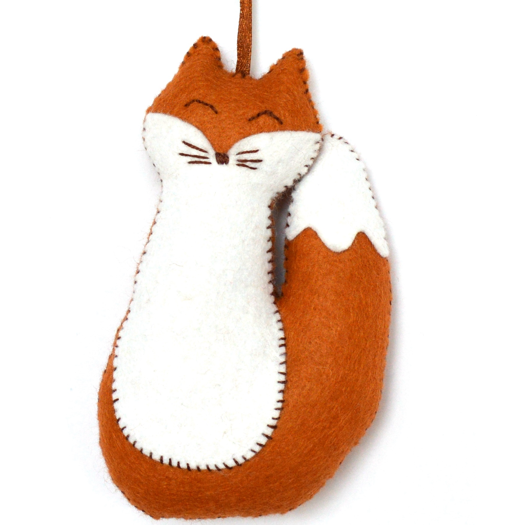Mini Fox sewing kit - showing finished fox on white background. Keep Creative Hands Busy with this Fox Sewing Kit This fox sewing kit contains everything you'll need to make a friendly felt fox that you can hang in a child's bedroom or use as Christmas decorations. Great for beginners and seasoned crafters.