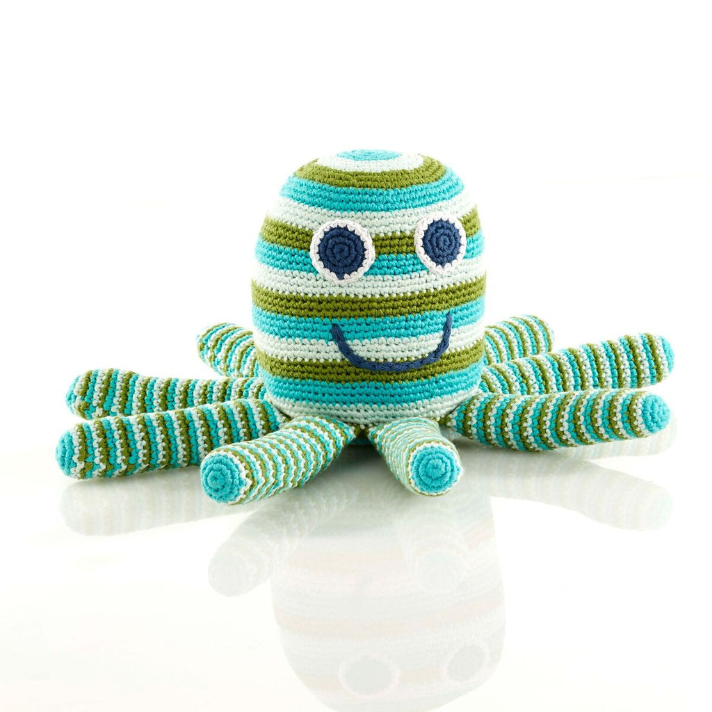 A lovable Octopus Soft Toy - Fair Trade Too This adorable blue and green striped Octopus soft toy makes a gorgeous gift for new babies, christenings and first Christmas. They are hand-knitted by a team of people in rural Bangladesh, as this is a fair trade toy all the workers are fairly paid. Beautiful bright colours.  Handmade, fair trade and adorable! Octopus on white background