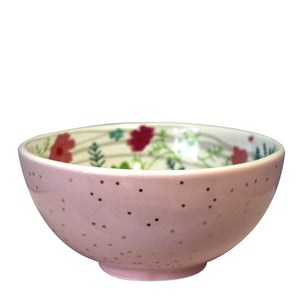 Outside View -Mouse Bowl - Disaster Designs - aerial view. The porcelain bowl has a pretty pale pink glaze on the outside with gold foil polka dots. 