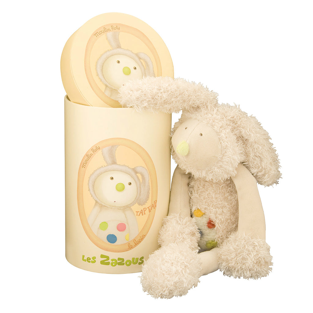A Wonderful Gift - Rabbit Soft Toy! This lovely cuddly cream rabbit soft toy has a tufted velour spotty tummy and feet. A gift that a child is sure to hold onto from the moment they open the beautifully illustrated gift box. Showing rabbit sitting beside gift box