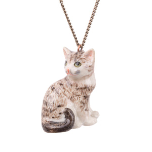 Hand-painted porcelain tabby cat necklace - a beautiful gift for cat lovers. A beautifully hand-painted tabby cat with intricate detail on the face with green eyes, pink nose, and whiskers. Adorable!  This cat is featured on an antique brass plated chain.  These hand-painted porcelain necklaces have amazing detailed features that make the tabby cat necklace look adorable.  A real keepsake you'll treasure for years to come. Designed and hand-finished in Scotland.