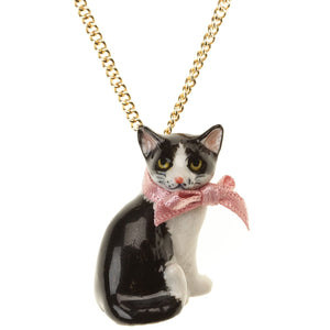 Black and White Cat Necklace - beautifully designed porcelain cat necklace with a pink bow. Handpainted. Designed in Scotland.
