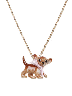 Chihuahua necklace is charming and cute This chihuahua necklace, made from hand painted porcelain, is decorated with a baby pink bow. These hand painted necklaces have amazing detailed features that make the chihuahua look adorable. A real keepsake. Dog on white background