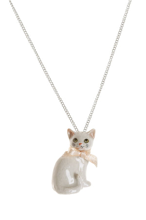White Cat Necklace - hand painted and beautifully designed white cat with pale pink bow. Intricate detail on the face with yellow eyes and pink nose with whiskers. Hand finished in Scotland
